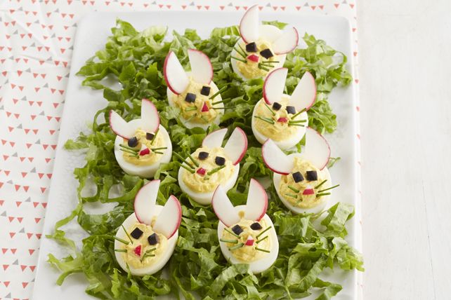 Фото идеи украшения салата в виде Кроликов